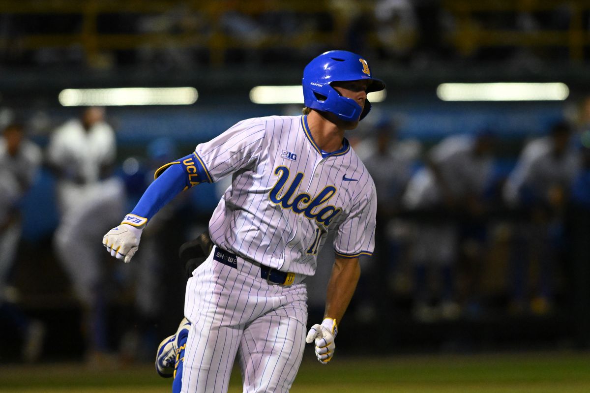 UCLA Bruins outfielder Payton Brennan (11) runs to first base after making contact during an NCAA baseball game between University of Southern California and University of California Los Angeles on Friday, April 3, 2026 at Jackie Robinson Stadium in Los Angeles Calif UCLA Bruins outfielder Payton Brennan (11) runs to first base after making contact during an NCAA baseball game between University of Southern California and University of California Los Angeles on Friday, April 3, 2026 at Jackie Robinson Stadium in Los Angeles Calif