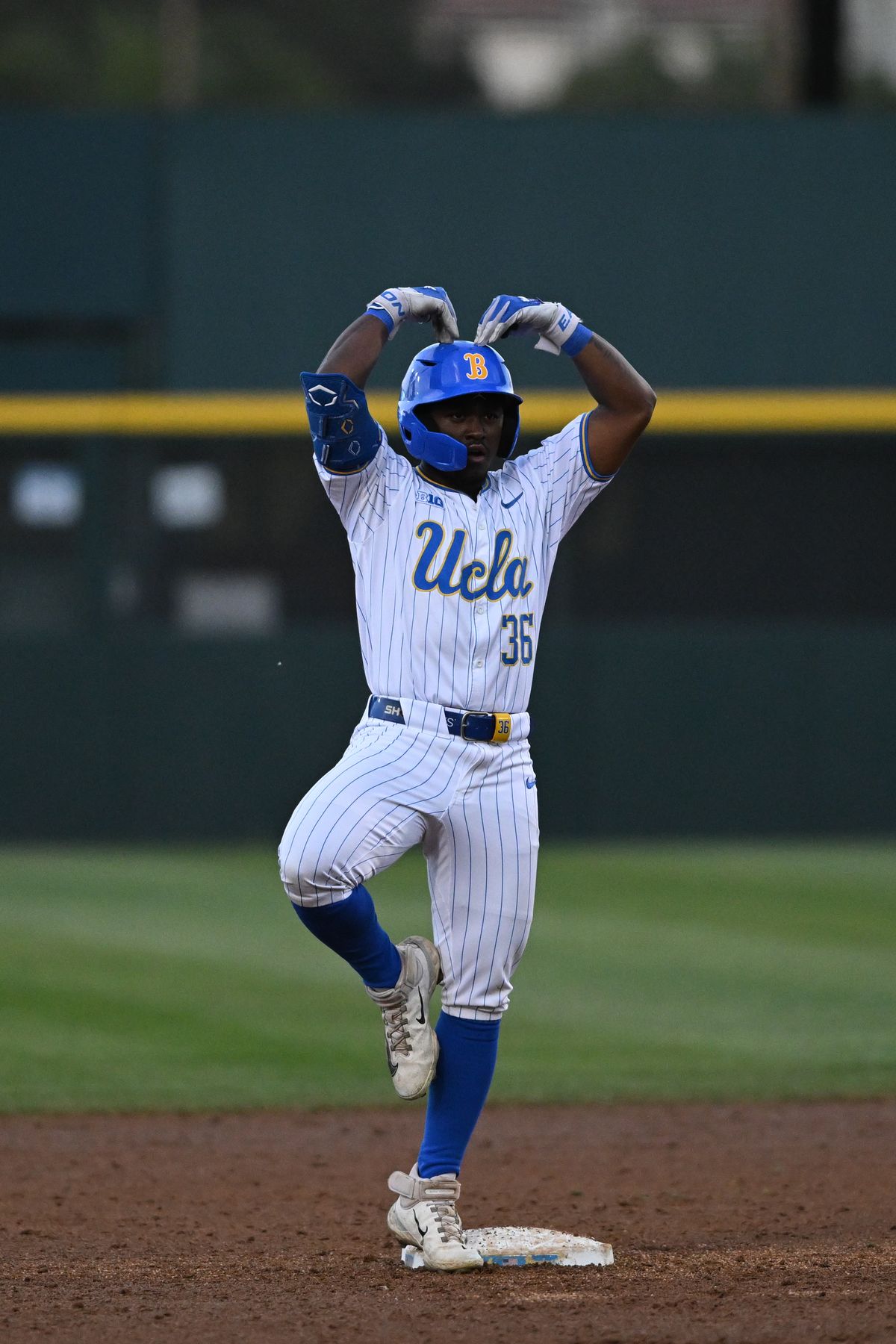 UCLA Bruins outfielder Dean West (36) reacts after completing a base hit during an NCAA baseball game between University of Southern California and University of California Los Angeles on Friday, April 3, 2026 at Jackie Robinson Stadium in Los Angeles Calif UCLA Bruins outfielder Dean West (36) reacts after completing a base hit during an NCAA baseball game between University of Southern California and University of California Los Angeles on Friday, April 3, 2026 at Jackie Robinson Stadium in Los Angeles Calif