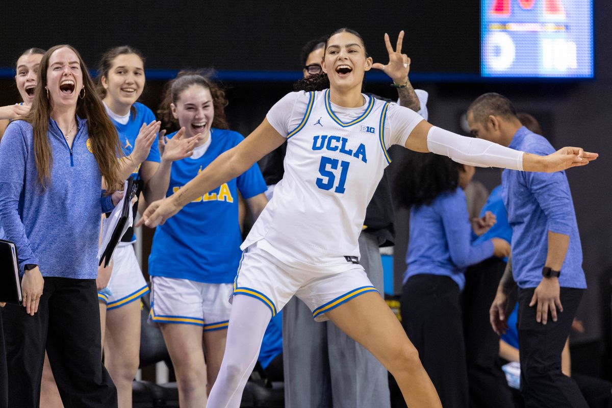 Lauren Betts #51 of the UCLA Bruins celebrates a made three point shot during an NCAA basketball game against the Maryland Terrapins, Sunday January 18, 2026 in Los Angeles, Calif.