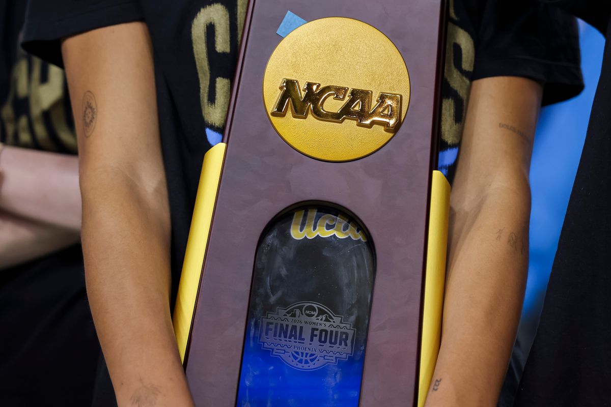 Lauren Betts holds the NCAA National Championship trophy during the celebration for the NCAA Champion UCLA Bruins Women’s basketball team, Wednesday April 8, 2026, in Los Angeles, Calif.