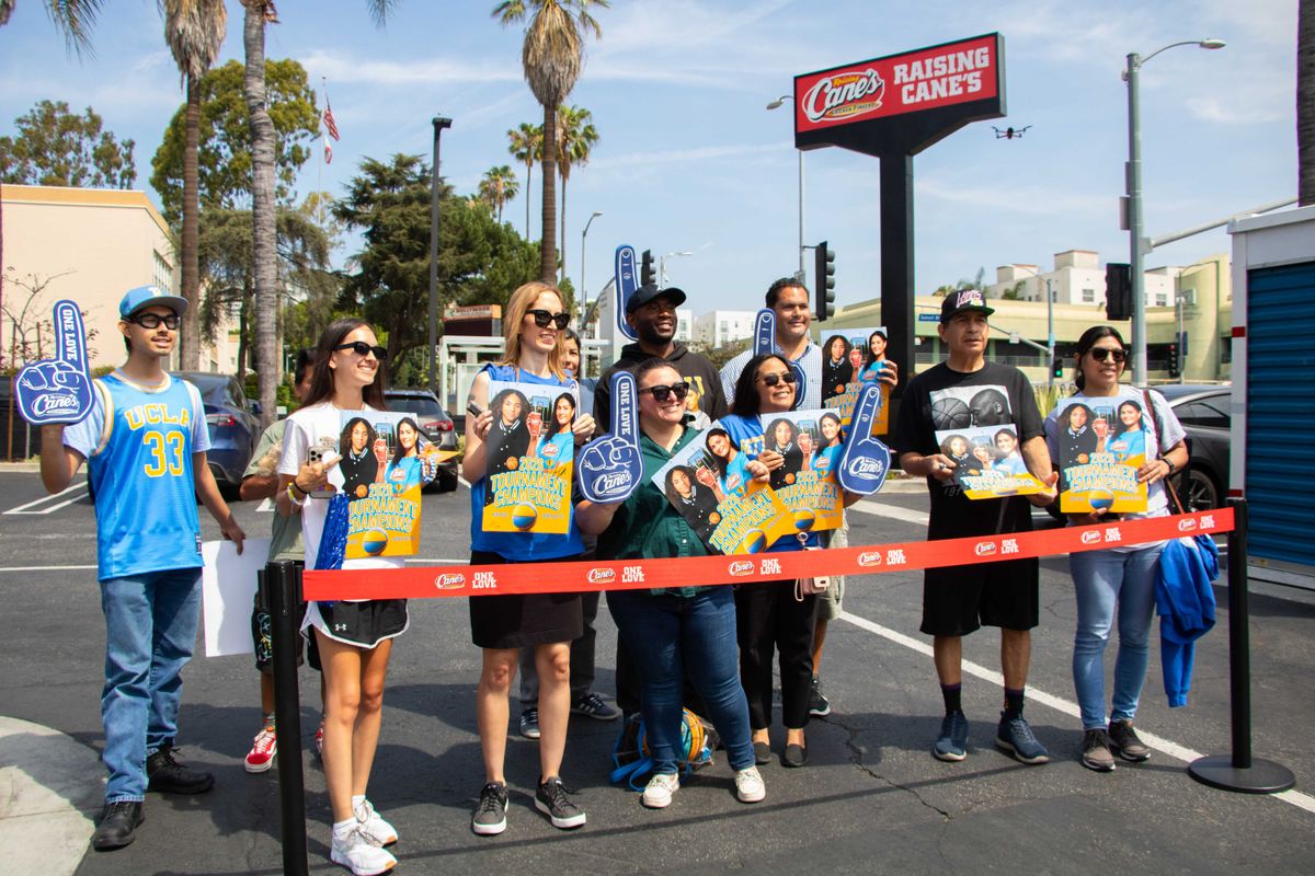 UCLA fans gather outside of Raising Cane's in Hollywood, CA. UCLA fans gather outside of Raising Cane's in Hollywood, CA.