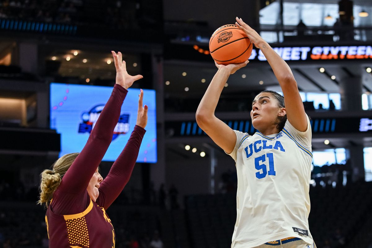 UCLA Bruins center Lauren Betts (51) shoots against Minnesota Golden Gophers center Sophie Hart (52) during a Sweet Sixteen game of the Sacramento Regional 2 of the women's 2026 NCAA Tournament at Golden 1 Center. 