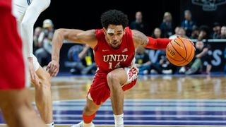 UNLV bounced from Mountain West tournament by Utah State taken at Thomas & Mack Center  (UNLV). Photo by Kalin Sipes - The Sporting Tribune