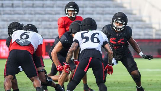SDSU linebacker Sione Hala (56), SDSU center Isaac Lucas (56) participates in the First scrimmage at Snapdragon Stadium on Saturday August 15, 2026 in San Diego, Calif.. SDSU linebacker Sione Hala (56), SDSU center Isaac Lucas (56) participates in the First scrimmage at Snapdragon Stadium on Saturday August 15, 2026 in San Diego, Calif..