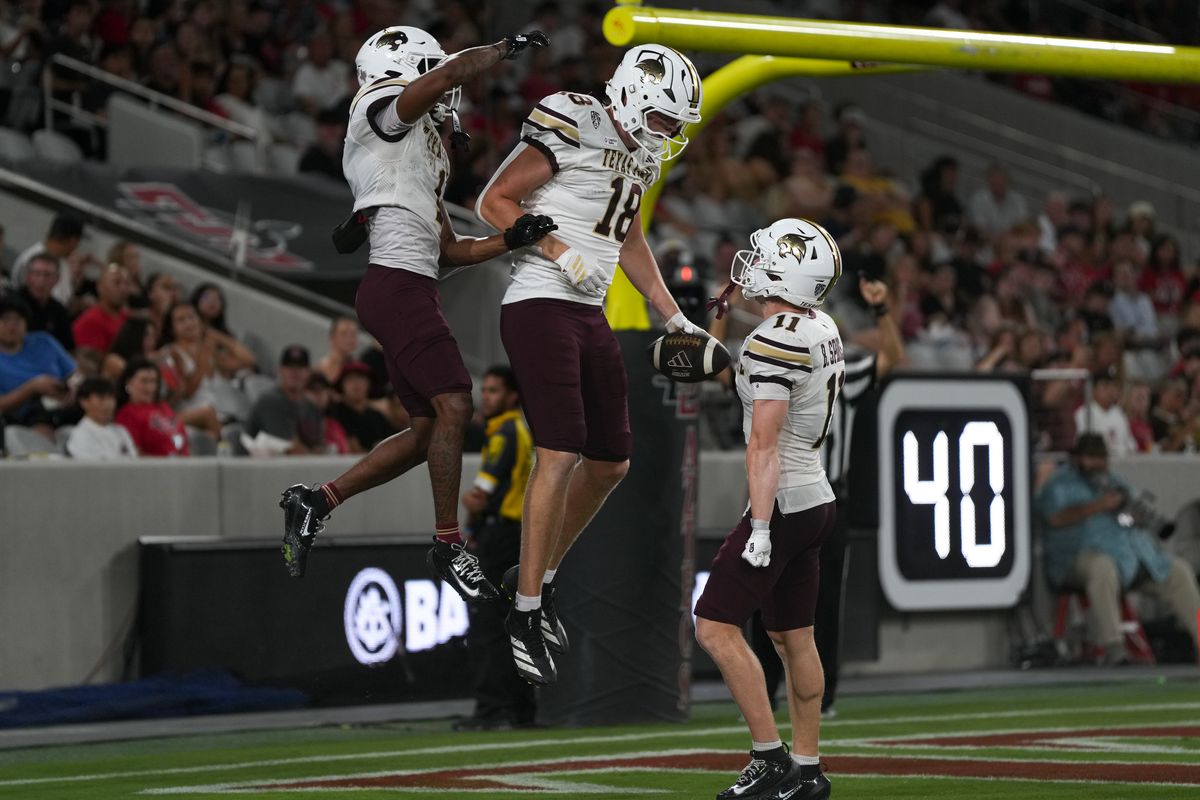 Texas State University tight end Ty Stamey (18) celebrates with teammates after scoring a touchdown during an NCAA football game against San Diego State University, Saturday October 03, 2026 in San Diego, California.