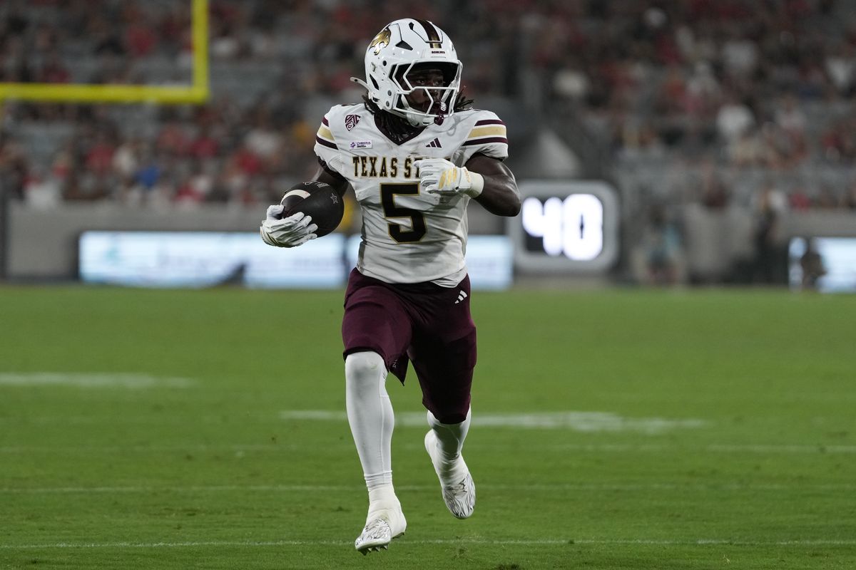 Texas State University running back Jaylen Jenkins (5) runs up the field during an NCAA football game against San Diego State University, Saturday October 03, 2026 in San Diego, California.