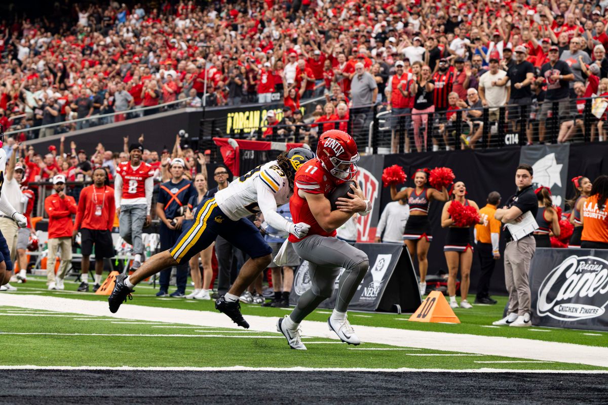 UNLV Rebels QB Jackson Arnold (11) scores a rushing touchdown in the second quarter of a game against the California Golden Bears on Saturday, October 03, 2026, at Allegiant Stadium in Las Vegas, Nevada.