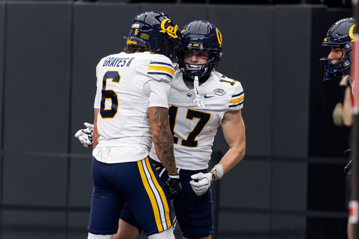 California Golden Bears RB Carson Perry-Smith (21) celebrates with teammate Emmanuel Okoye (6) after scoring a touchdown in the third quarter of a game against the UNLV Rebels on Saturday, October 03, 2026, at Allegiant Stadium in Las Vegas, Nevada.