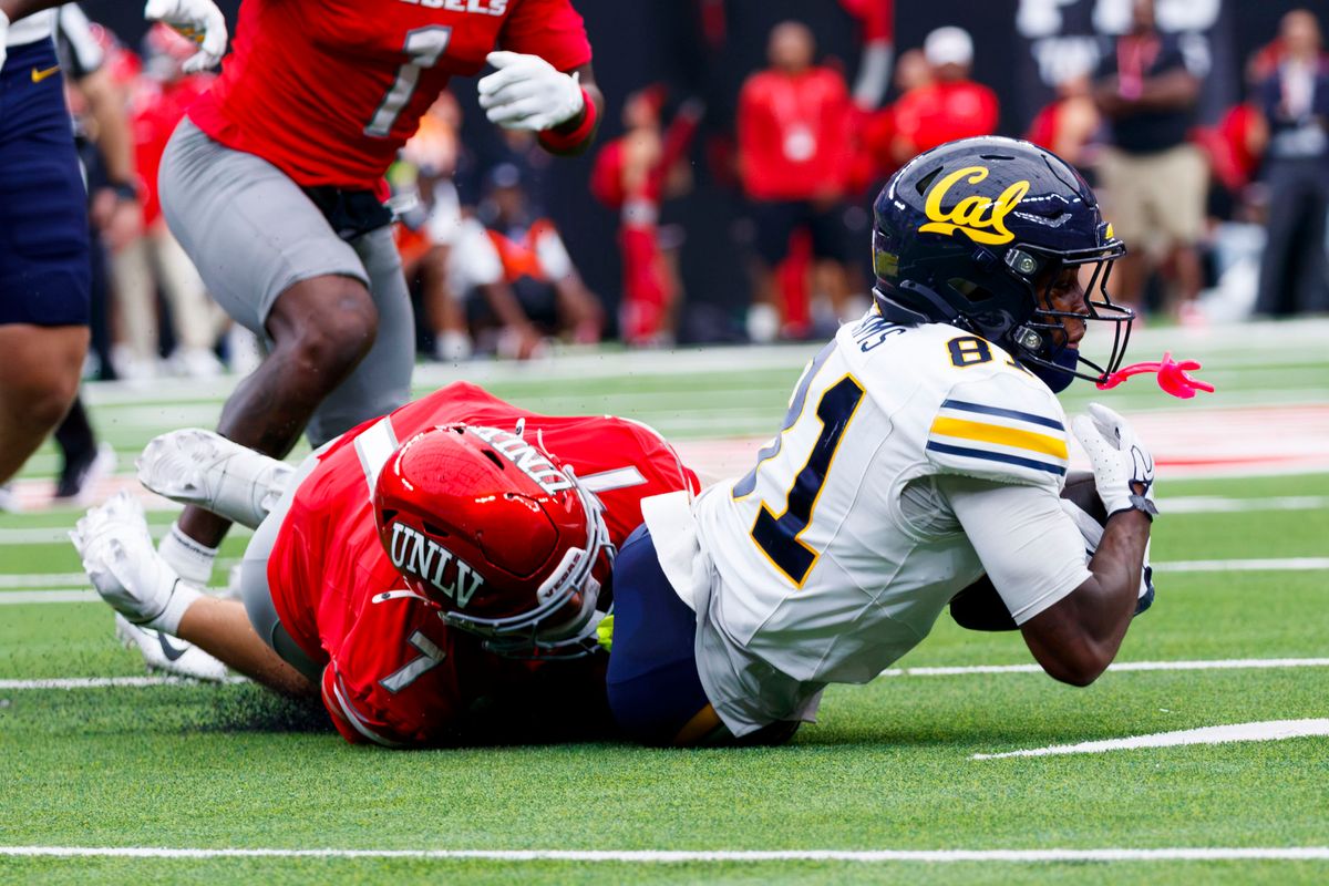 UNLV Football safety Jake Pope (7) tackles California Golden Bears wide reciever Tyree Sams (81) during the second quarter of a game on Saturday, October 3, 2026, at Allegiant Stadium.