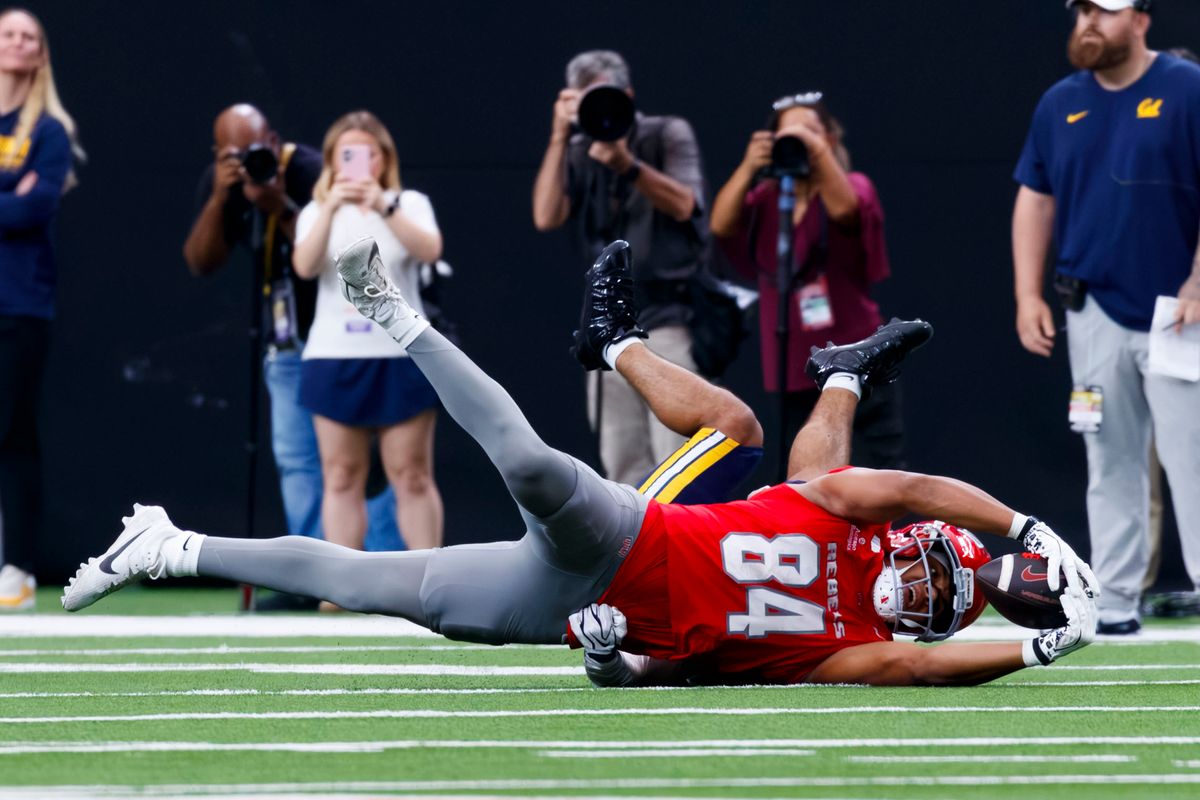 UNLV Football tight end Keyan Burnett (84) catches a pass from UNLV Football quarterback Jackson Arnold (11) during the third quarter of a game on Saturday, October 3, 2026, at Allegiant Stadium.