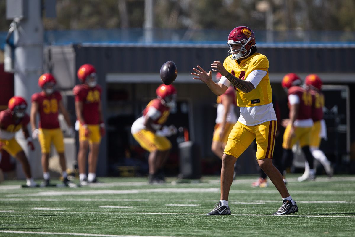 USC quarterback Jayden Maiava (14) takes a snap during practice at Howard Jones Field, Tuesday, Aug. 18, 2026, in Los Angeles. USC quarterback Jayden Maiava (14) takes a snap during practice at Howard Jones Field, Tuesday, Aug. 18, 2026, in Los Angeles.