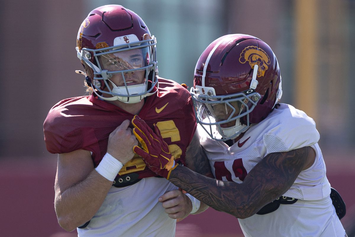 USC wide receiver Luke Degner (86) and cornerback RJ Sermons (21) go one on one during practice at Howard Jones Field, Wednesday, Aug. 19, 2026, in Los Angeles.