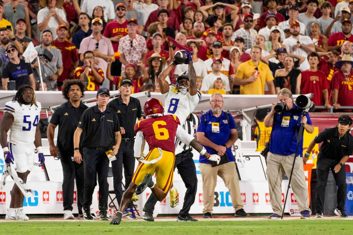 Chris Lawson #8 of the Washington Huskies with a contested fourth down catch during a NCAA football game against the USC Trojans, Saturday October 3rd, 2026 in Los Angeles, California. Chris Lawson #8 of the Washington Huskies with a contested fourth down catch during a NCAA football game against the USC Trojans, Saturday October 3rd, 2026 in Los Angeles, California.