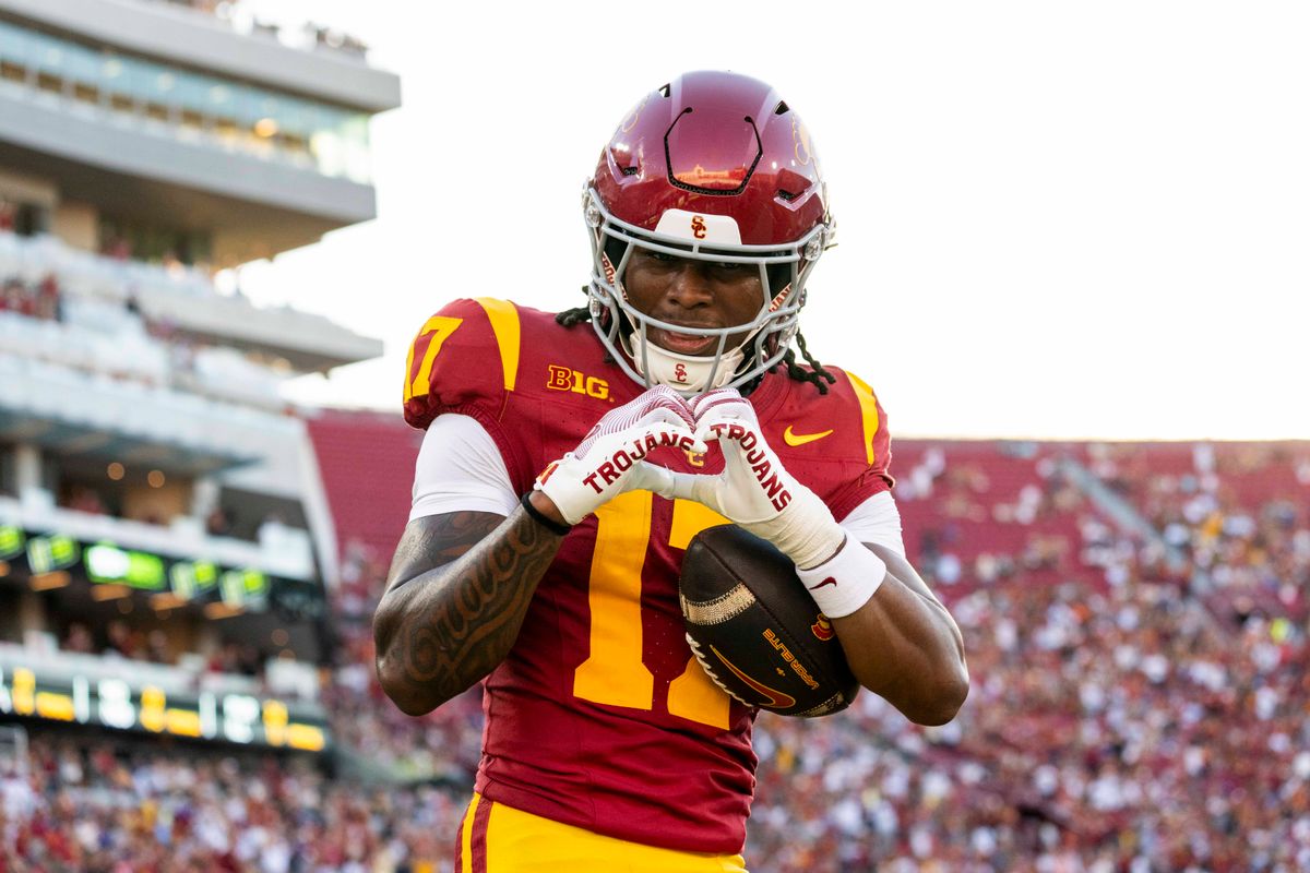 Kayden Dixon-Wyatt #17 of the USC Trojans flashes a heart after a catch, which eventually was called back, during a NCAA football game against the UW Huskies, Saturday October 3rd, 2026 in Los Angeles, California. Kayden Dixon-Wyatt #17 of the USC Trojans flashes a heart after a catch, which eventually was called back, during a NCAA football game against the UW Huskies, Saturday October 3rd, 2026 in Los Angeles, California.