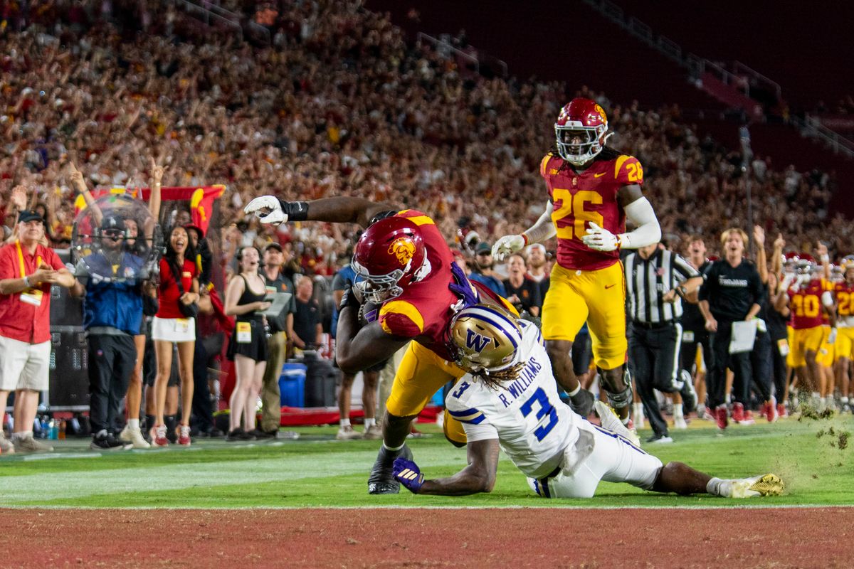 Jahkeem Stewart #4 of the USC Trojans returns a fumble in for a defensive touchdown during a NCAA football game against the Washington Huskies, Saturday October 3rd, 2026 in Los Angeles, California. Jahkeem Stewart #4 of the USC Trojans returns a fumble in for a defensive touchdown during a NCAA football game against the Washington Huskies, Saturday October 3rd, 2026 in Los Angeles, California.