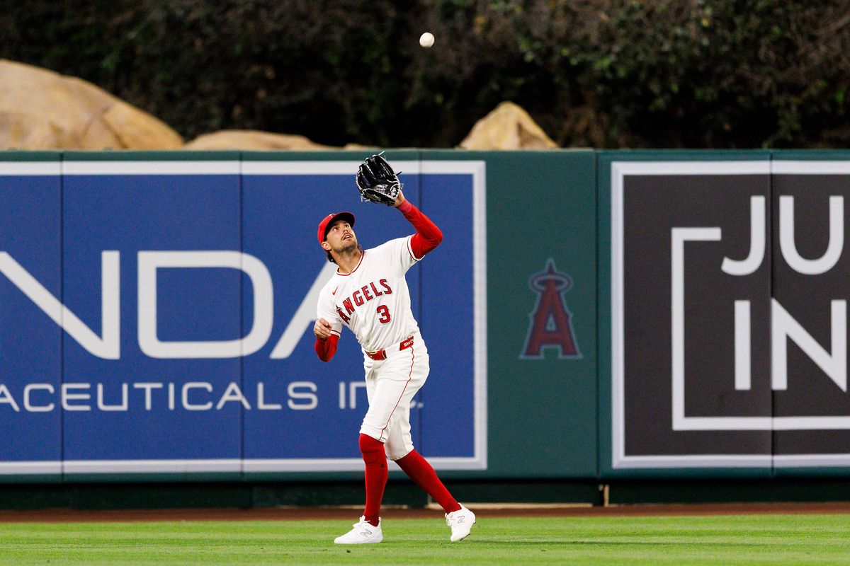 Josh Lowe #3 of the Los Angeles Angels catches a fly ball during the game against the Seattle Mariners at Angel Stadium of Anaheim on April 3, 2026 in Anaheim, California.