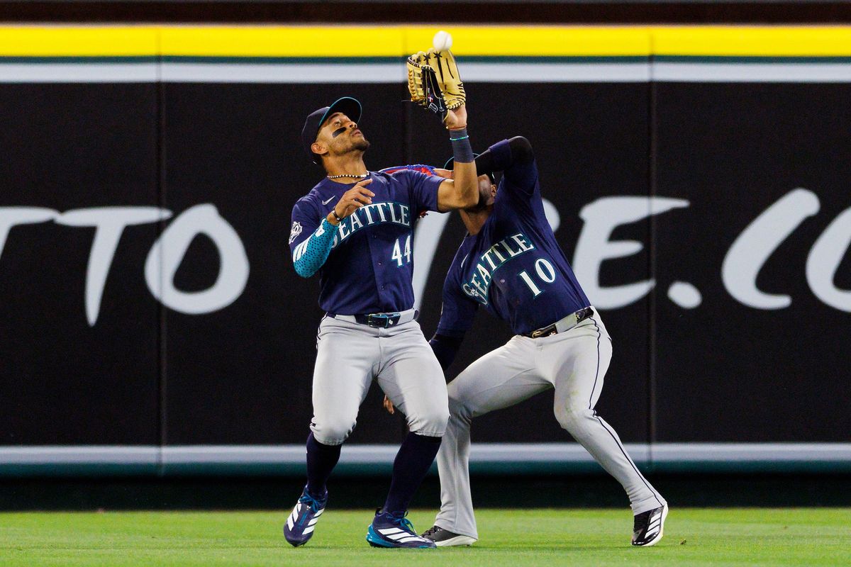 Julio Rodriguez #44 of the Seattle Mariners catches a fly ball during the game against the Los Angeles Angels at Angel Stadium of Anaheim on April 3, 2026 in Anaheim, California.