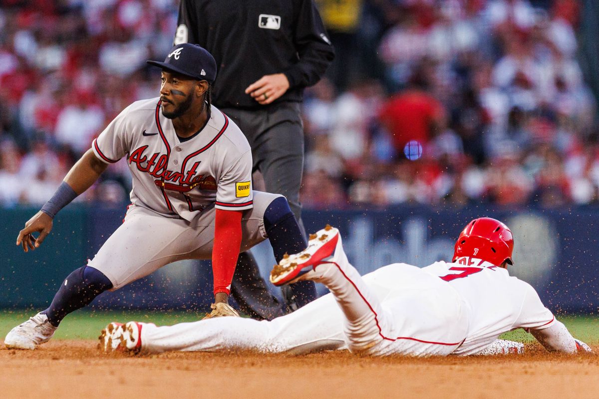 Jo Adell #7 of the Los Angeles Angels steals a base during an MLB game against the Atlanta Braves at Angel Stadium on April 7, 2026 in Anaheim, California.