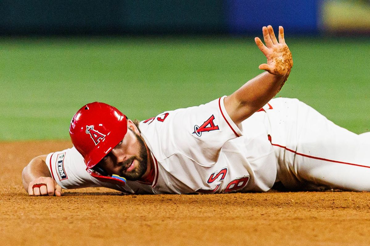 Nolan Schanuel #18 of the Los Angeles Angels signals for time during an MLB game against the Atlanta Braves at Angel Stadium on April 7, 2026 in Anaheim, California.