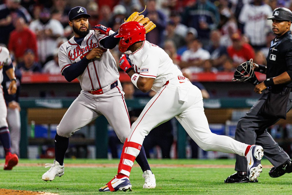 Jorge Soler #12 of the Los Angeles Angels fights Reynaldo López #40 of the Atlanta Braves during an MLB game against the Atlanta Braves at Angel Stadium on April 7, 2026 in Anaheim, California.