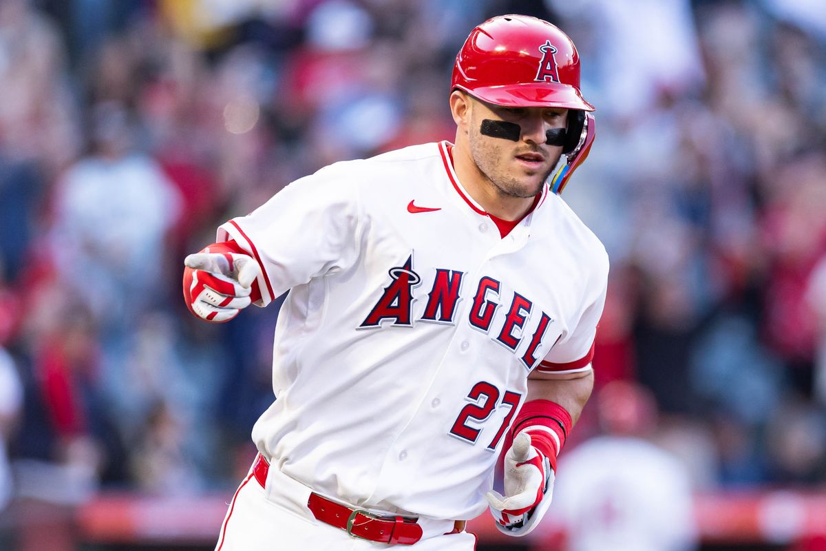 Mike Trout #27 of the Los Angeles Angels celebrates after hitting a home run during an MLB game against the Texas Rangers on May 23, 2026 at Angel Stadium in Anaheim, California.