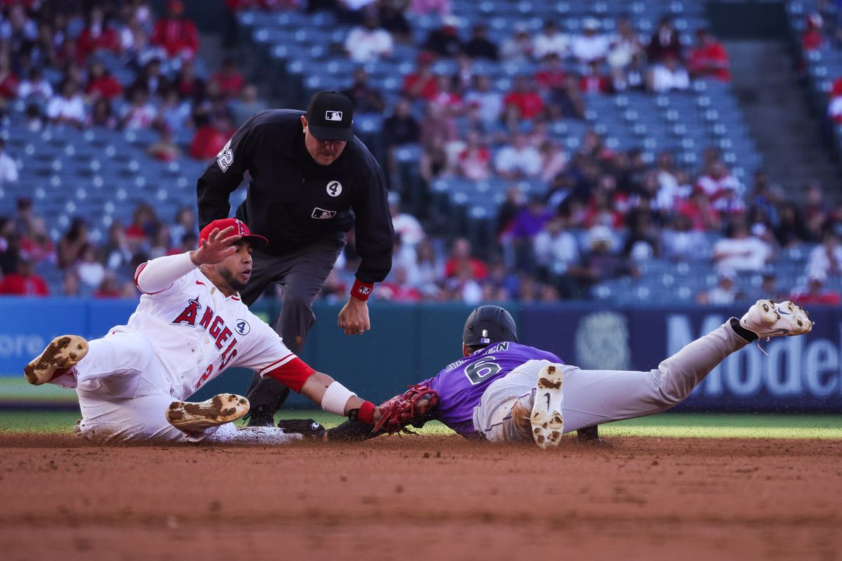 Los Angeles Angels infielder Oswald Peraza (2) slides to tag a runner during the MLB game against the Colorado Rockies Tuesday June 2nd, 2026 at Angel's Stadium in Anaheim, Calif.