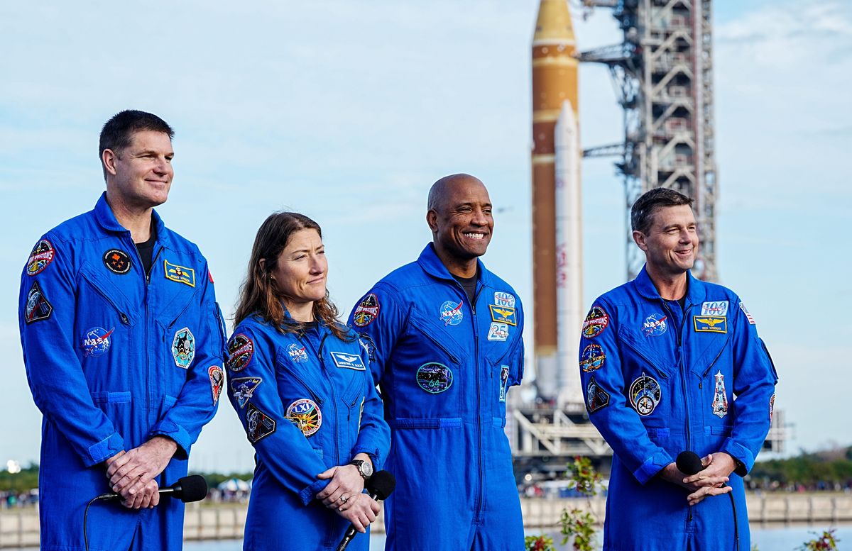 The crew of Artemis II (from left) Jeremy Hansen, Christina Koch, Victor Glover and Reid Wiseman pose for pictures as their ride to the moon is transported from the Vehicle Assembly Building at Kennedy Space Center, Fla. to the launch pad Jan. 17, 2026. The crew of Artemis II (from left) Jeremy Hansen, Christina Koch, Victor Glover and Reid Wiseman pose for pictures as their ride to the moon is transported from the Vehicle Assembly Building at Kennedy Space Center, Fla. to the launch pad Jan. 17, 2026.