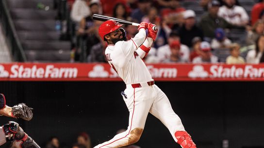 Los Angeles Angels center fielder Jo Adell (7) hits a home run during an MLB game against the Atlanta Braves, Monday April 6, 2026, in Los Angeles, Calif.