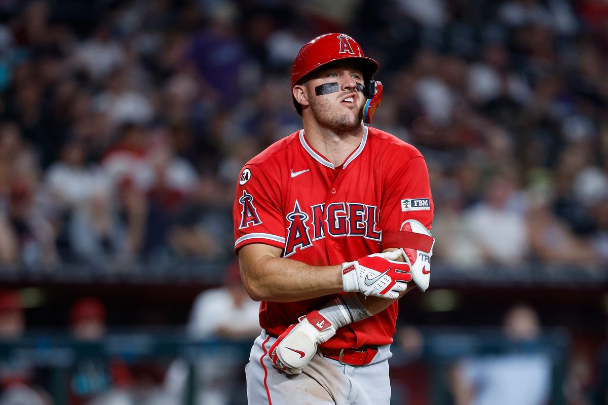 Mike Trout #27 of the Los Angeles Angels reacts affect being hit by a pitch against Arizona Diamondbacks at Chase Field on June 16, 2026 in Phoenix, Arizona.