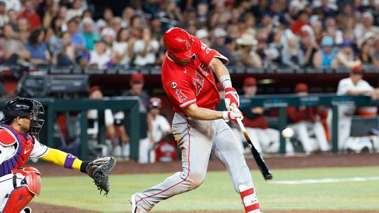 Mike Trout #27 of the Los Angeles Angels hits a home run against Arizona Diamondbacks at Chase Field on June 16, 2026 in Phoenix, Arizona.