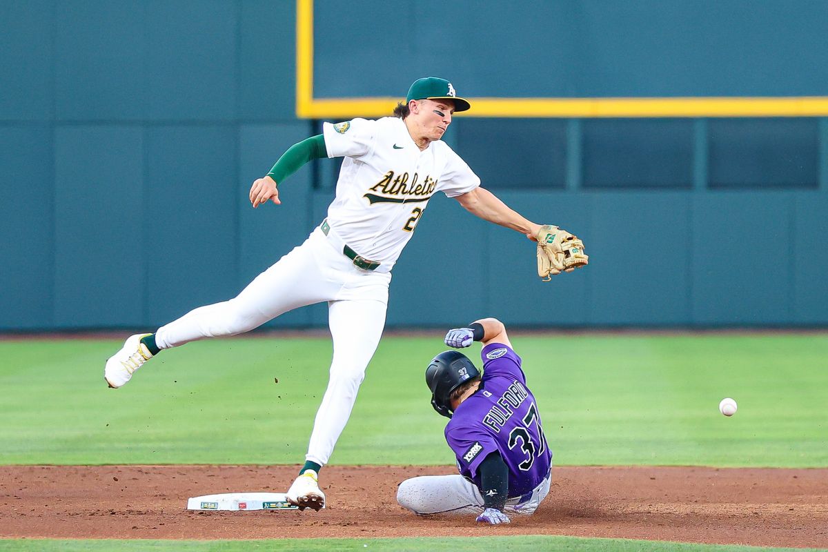 Colorado Rockies DH Braxton Fulford (37) slides under Athletics 2B Zack Gelof (20) after stealing the base during an MLB game on Friday June 12, 2026, at the Las Vegas Ballpark in Las Vegas, Nevada. Colorado Rockies DH Braxton Fulford (37) slides under Athletics 2B Zack Gelof (20) after stealing the base during an MLB game on Friday June 12, 2026, at the Las Vegas Ballpark in Las Vegas, Nevada.