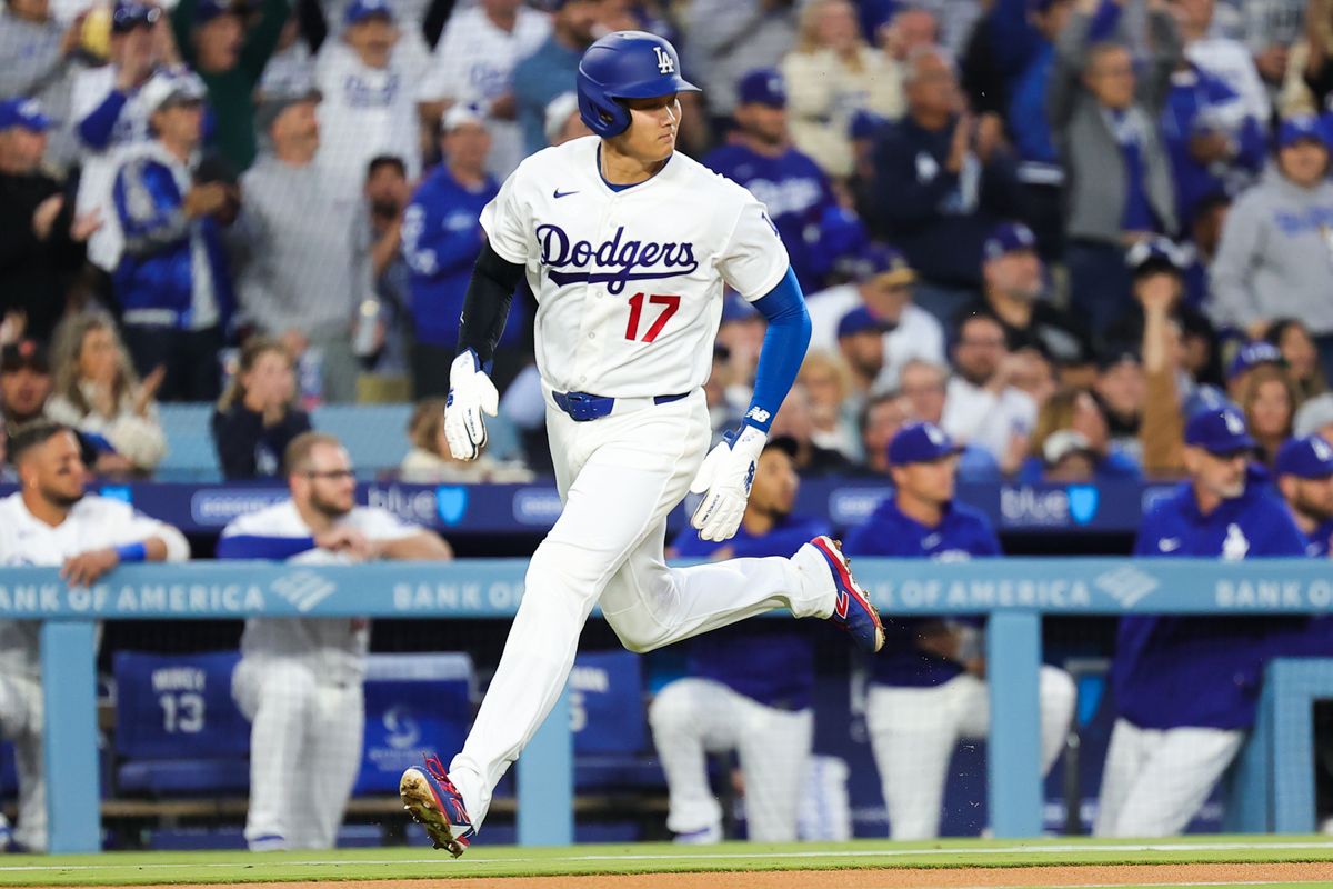 Shohei Ohtani #17 of the Los Angeles Dodgers runs to home plate during an MLB game against the New York Mets on April 13, 2026 in Los Angeles, CA. 