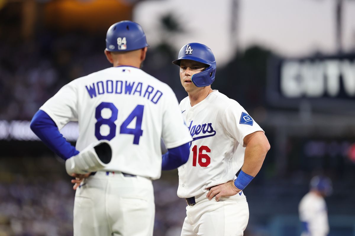 Will Smith #16 of the Los Angeles Dodgers talks to his first base coach during an MLB game against the New York Mets on April 13, 2026 in Los Angeles, CA. 