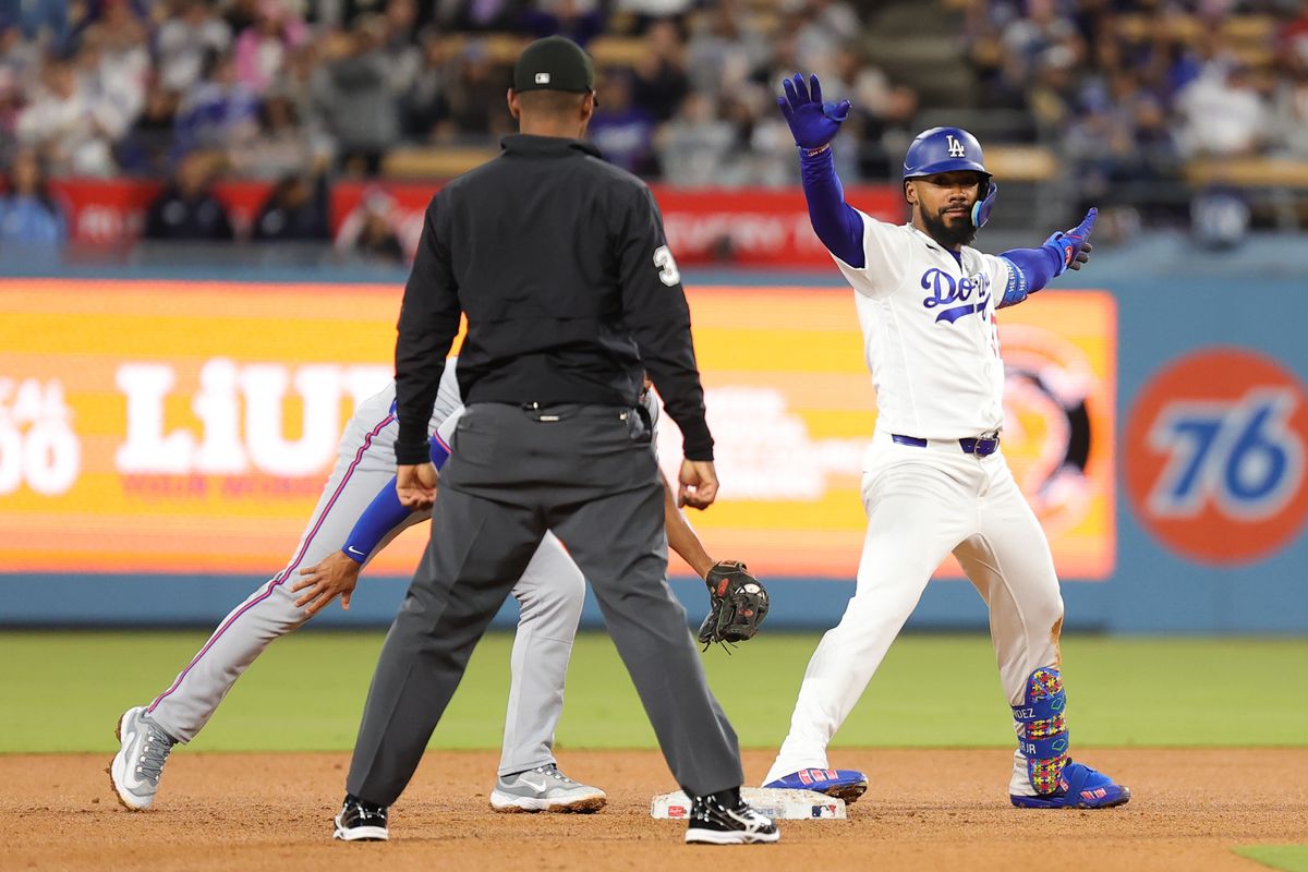 Teoscar Hernandez #37 of the Los Angeles Dodgers celebrates at second base during an MLB game against the New York Mets on April 13, 2026 in Los Angeles, CA. 