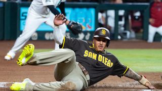 Padres hang 6 runs early, hold D-backs at arms reach rest of the way in win taken at Chase Field (San Diego Padres). Photo by Mark J. Rebilas - Imagn Images