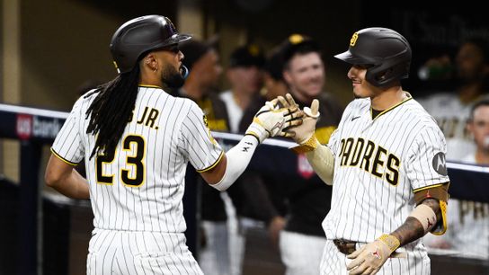 Aug 11, 2026; San Diego, California, USA; San Diego Padres right fielder Fernando Tatis Jr. (23) is congratulated by third baseman Manny Machado (13) after hitting a solo home run during the fourth inning against the Milwaukee Brewers at Petco Park. Aug 11, 2026; San Diego, California, USA; San Diego Padres right fielder Fernando Tatis Jr. (23) is congratulated by third baseman Manny Machado (13) after hitting a solo home run during the fourth inning against the Milwaukee Brewers at Petco Park.
