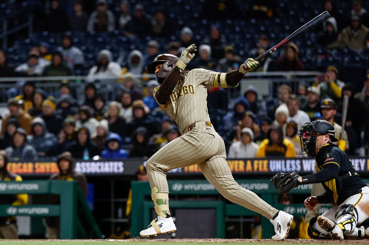 Fernando Tatis Jr. #23 hits a single against the Pirates at PNC Park on April 7, 2025 in Pittsburgh.