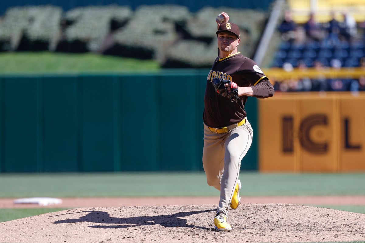 Mason Miller #22 throws a pitch against the Pirates at PNC Park on April 8, 2025 in Pittsburgh.