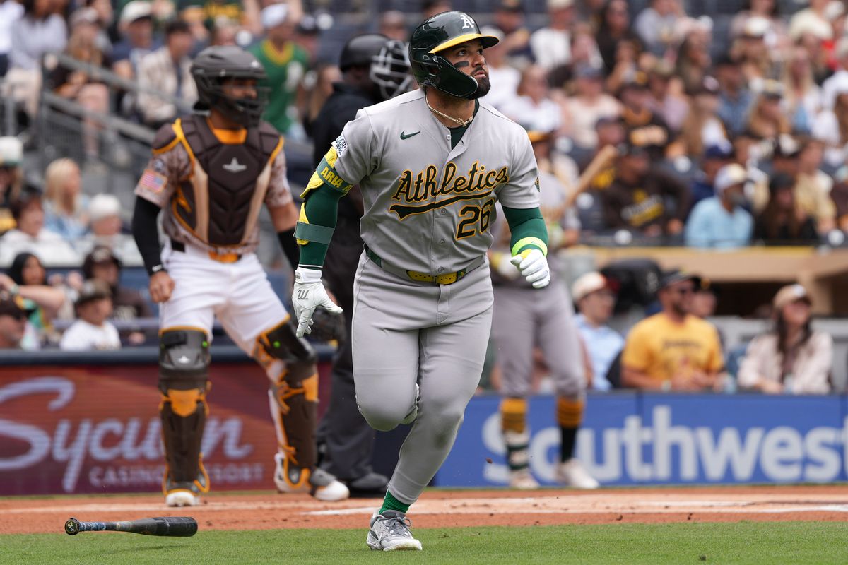 Athletics right fielder Carlos Cortes (26) watches the ball after hitting a home run during an MLB baseball game against the Padres, Sunday May 24, 2026 in San Diego, California.