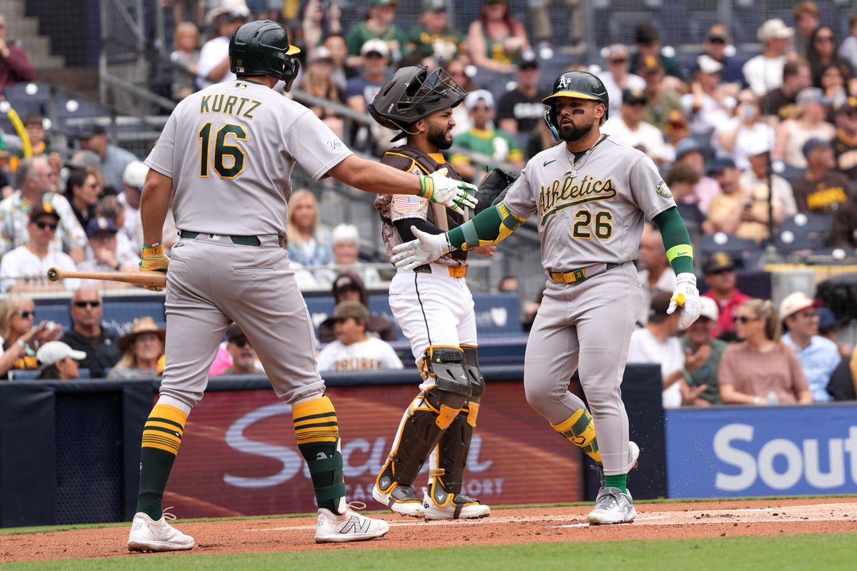Athletics right fielder Carlos Cortes (26) celebrates after hitting a home run during an MLB baseball game against the Padres, Sunday May 24, 2026 in San Diego, California.
