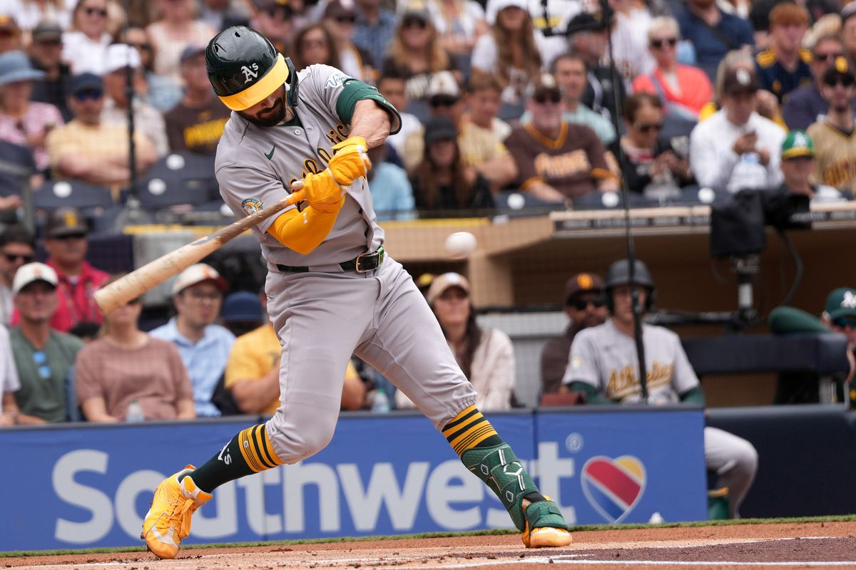 Athletics catcher Shea Langeliers (23) hits the ball during an MLB baseball game against the Padres, Sunday May 24, 2026 in San Diego, California.