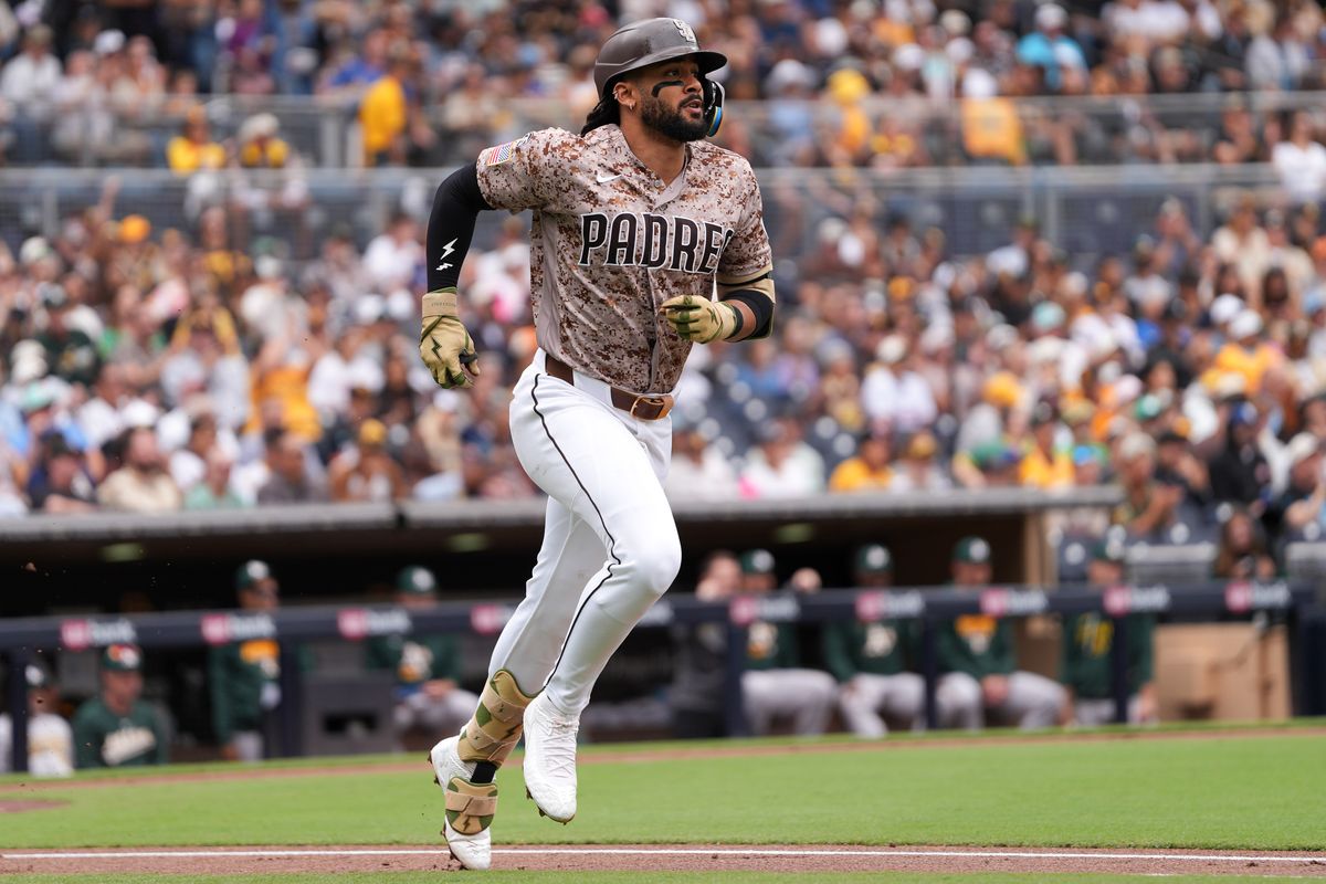 Padres right fielder Fernando Tatis Jr. (23) runs to first base during an MLB baseball game against the Athletics, Sunday May 24, 2026 in San Diego, California.