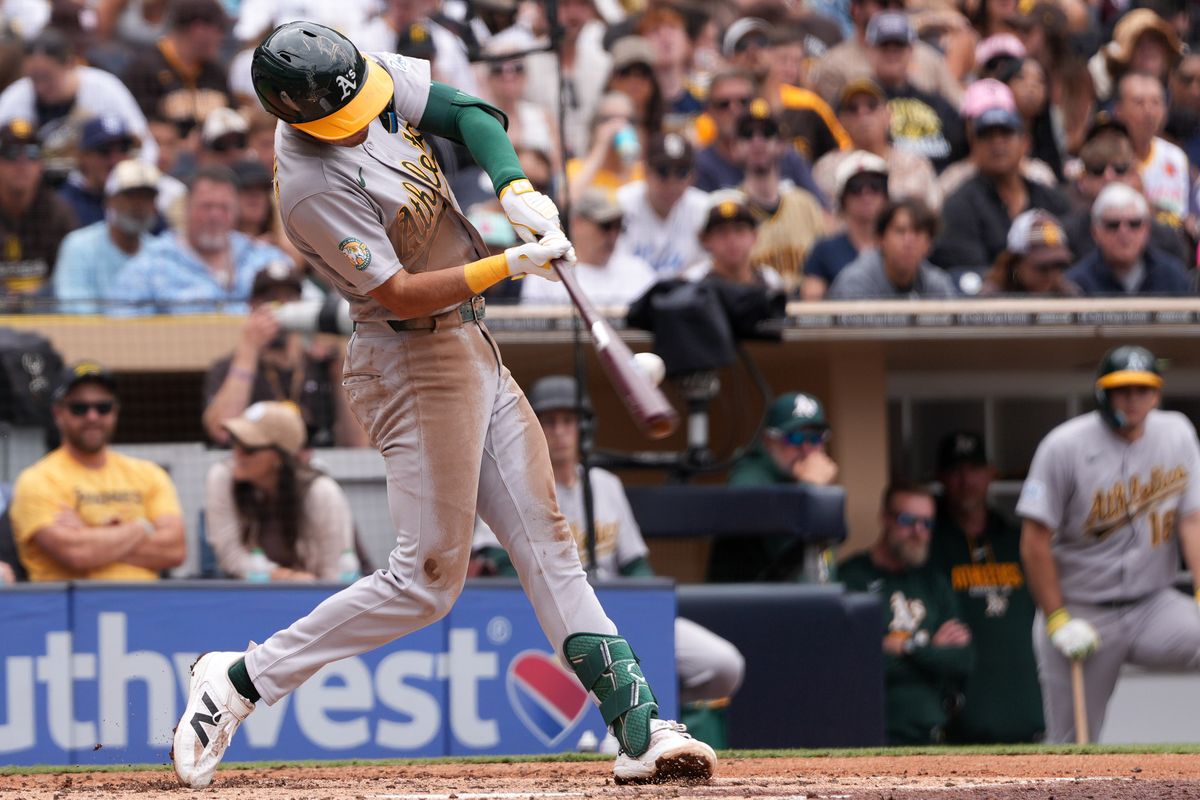 Athletics second baseman Alika Williams (12) hits a foul ball during an MLB baseball game against the Padres, Sunday May 24, 2026 in San Diego, California.
