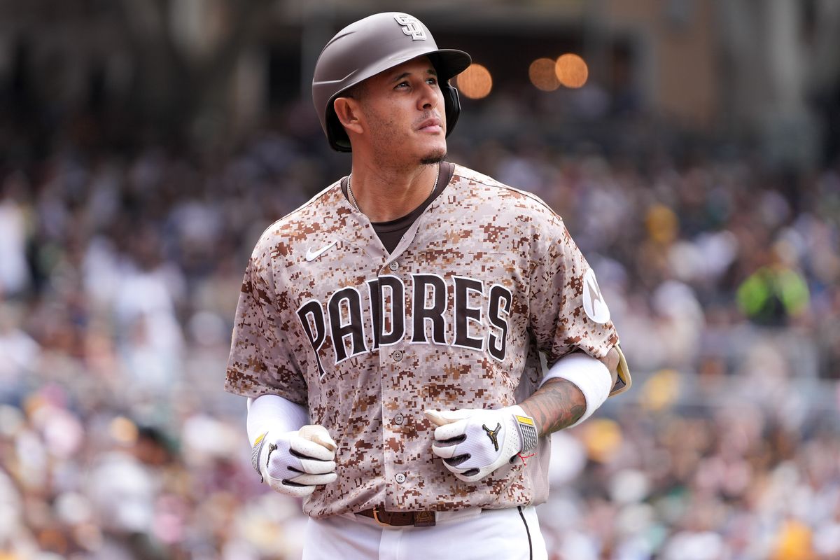 Padres third baseman Manny Machado (13) watches his hit get caught during an MLB baseball game against the Athletics, Sunday May 24, 2026 in San Diego, California.