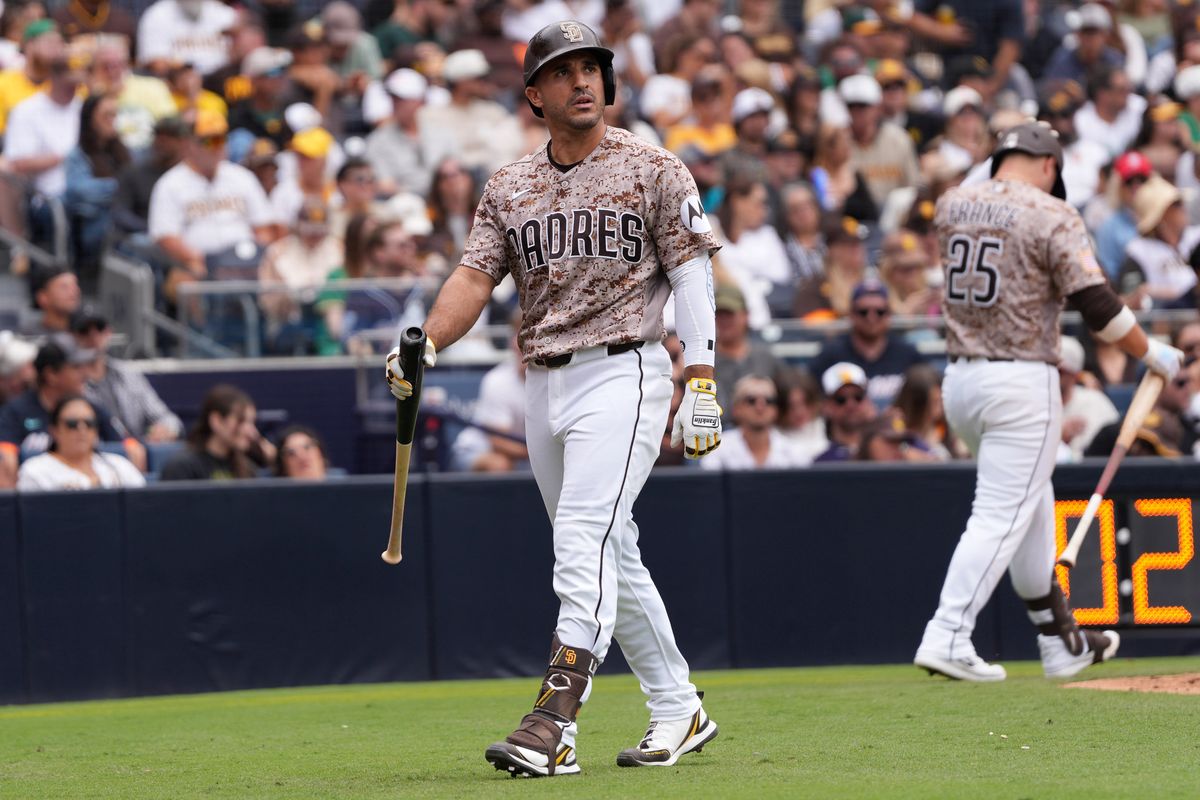 Padres left fielder Ramon Laureano (5) walks back to the dug out after striking out during an MLB baseball game against the Athletics, Sunday May 24, 2026 in San Diego, California.