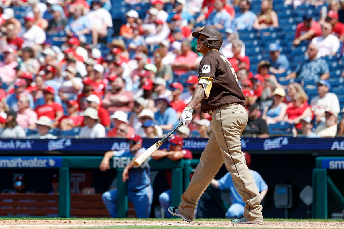 Manny Machado #13 of the San Diego Padres hits a home run against the Philadelphia Phillies at Citizens Bank Park on June 2, 2026 in Philadelphia, Pennsylvania.