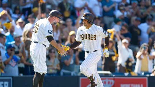 Mar 26, 2026; San Diego, California, USA; San Diego Padres left fielder Ramon Laureano (5) celebrates with third base coach Bob Henley (20) after hitting a one run home run during the seventh inning against the Detroit Tigers at Petco Park.