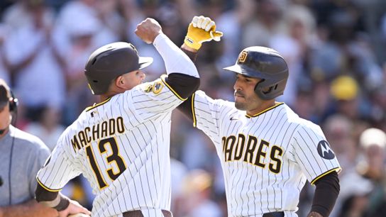 Apr 1, 2026; San Diego, California, USA; San Diego Padres right fielder Ramón Laureano (5), right, is congratulated by Manny Machado (13) after hitting a two-run home run during the eighth inning against the San Francisco Giants at Petco Park.