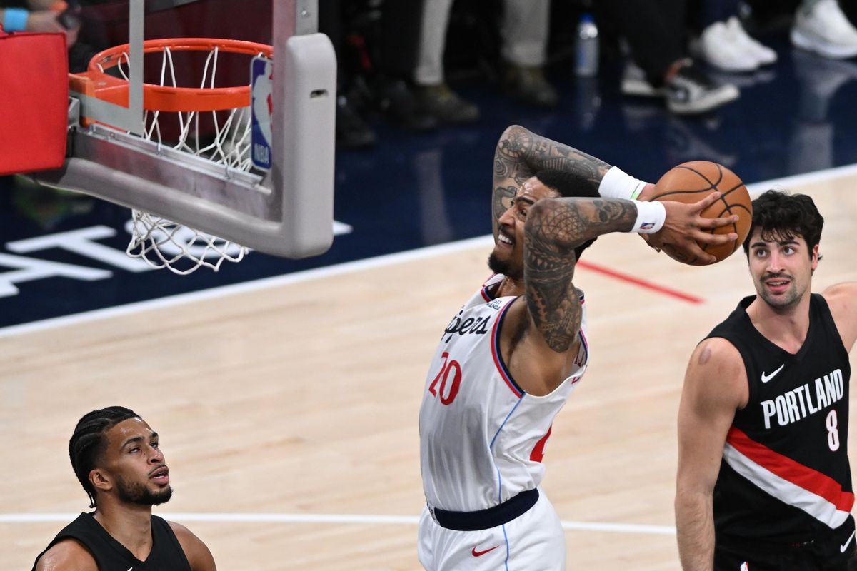 Los Angeles Clippers forward John Collins (20) jumps for a dunk during a game between the Los Angeles Clippers and the Portland Trailblazers on Tuesday, March 31, 2026 at Intuit Dome in Inglewood Calif