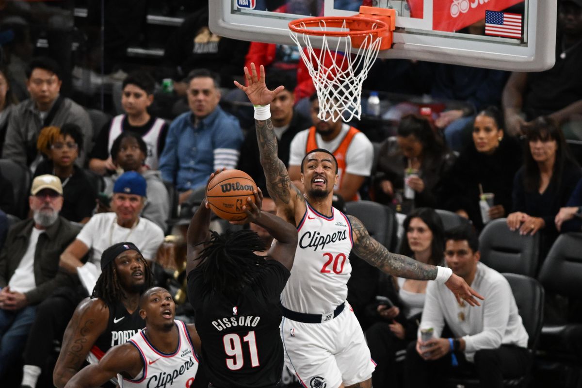 Los Angeles Clippers forward John Collins (20) jumps to block a shot during a game between the Los Angeles Clippers and the Portland Trailblazers on Tuesday, March 31, 2026 at Intuit Dome in Inglewood Calif